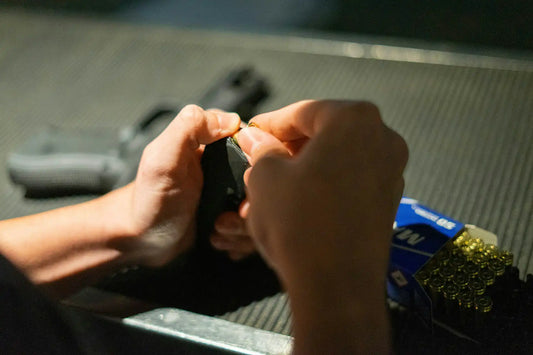Loading gun. Can You Carry with Just One in the Chamber? Concealed Carry Myths Busted